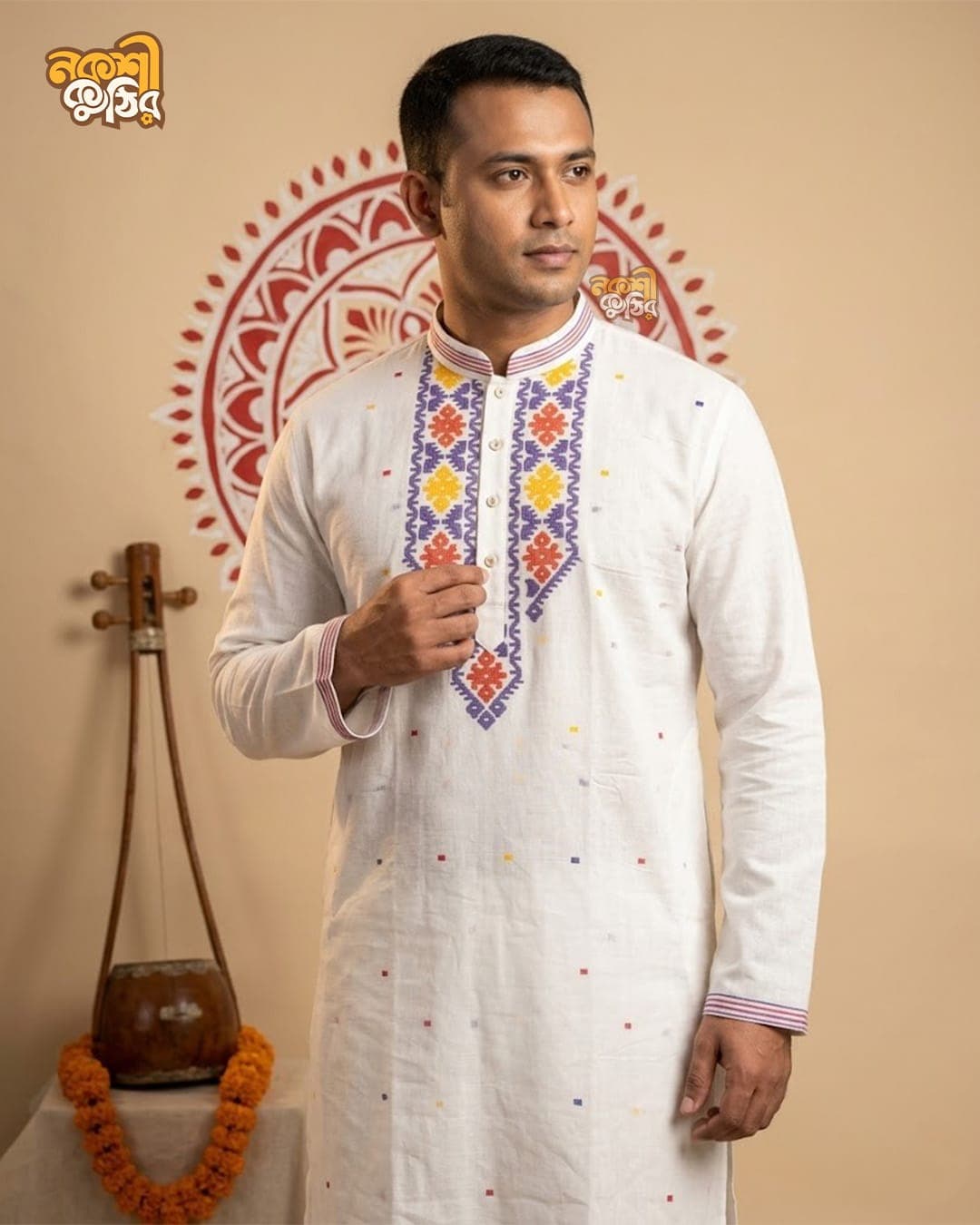 প্রিমিয়াম জামদানি পাঞ্জাবি — সাদা (নীল-কমলা কারুকাজ)